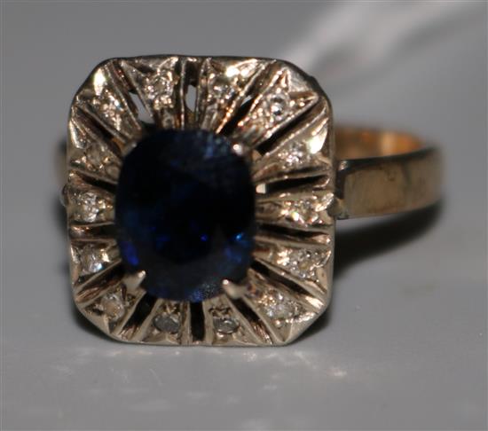 A sapphire and diamond cluster dress ring, size K.